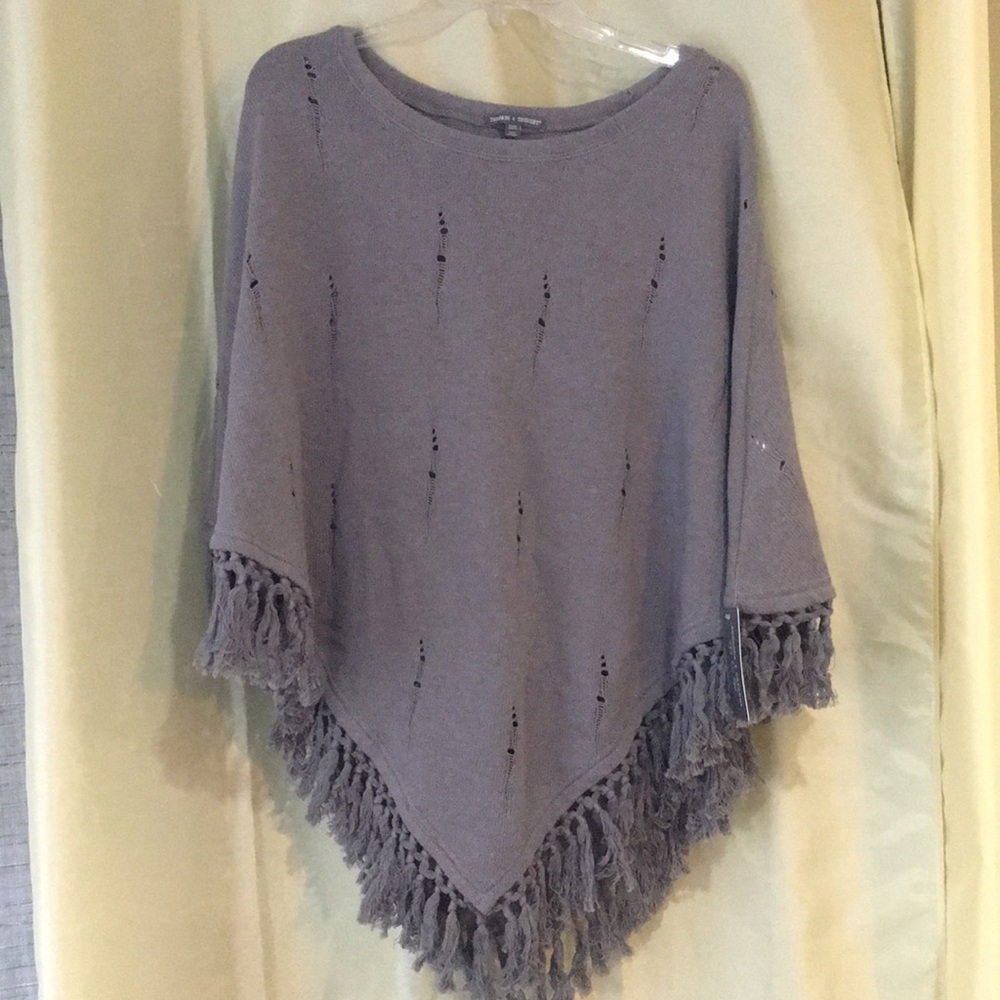 Grey poncho.